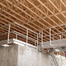 Clarifiers with Roof Trusses in background