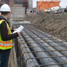 NAC individual inspecting electrical duct banks to be encased in concrete