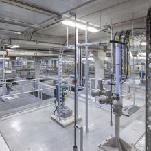 Tanks shown with mixers and guardrail 