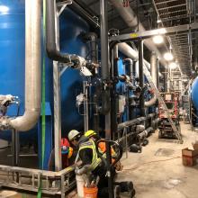 NAC workers completing install within process gallery