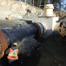 Pipe installation for manhole connection
